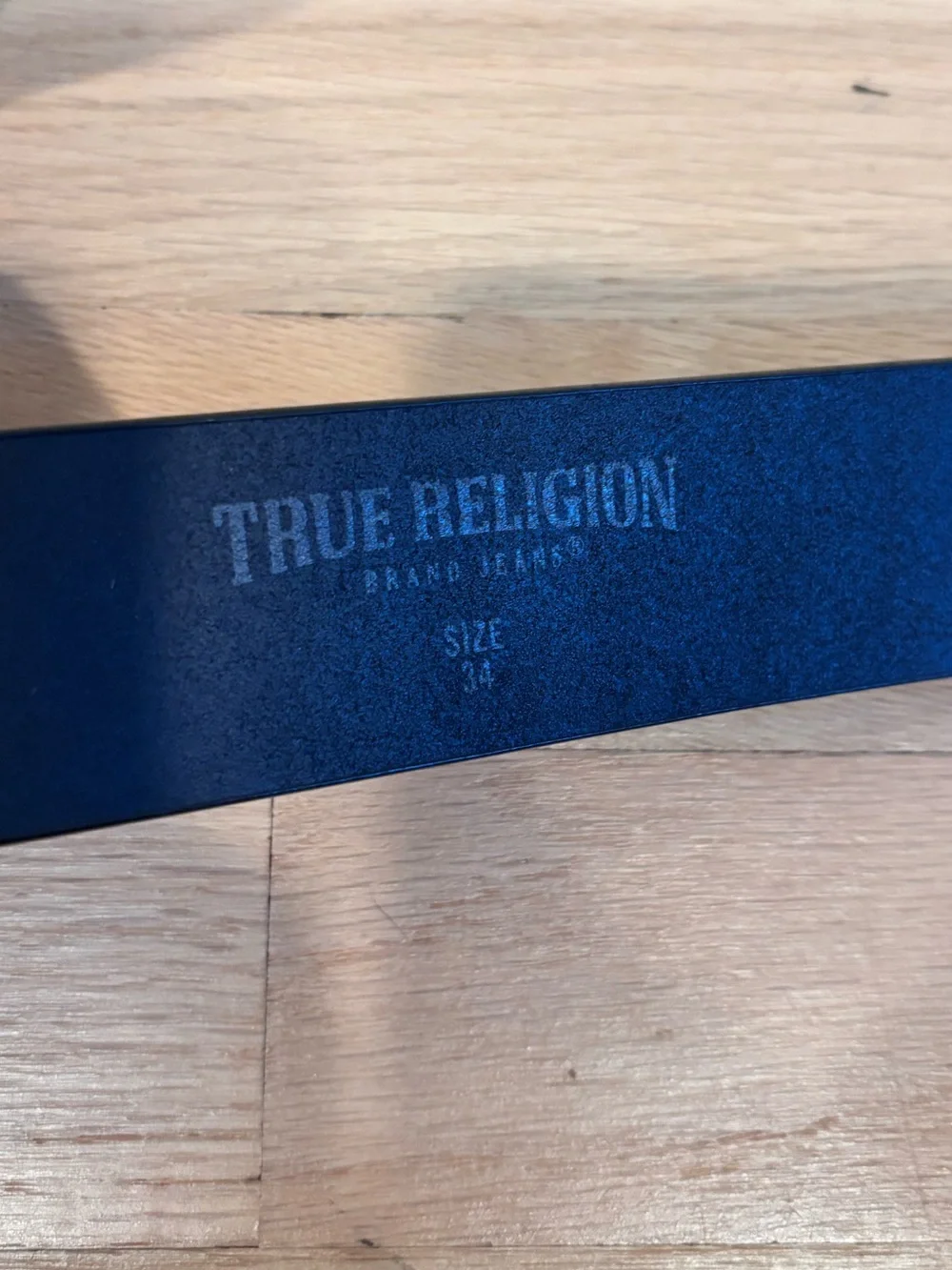 True Religion black leather belt with white horseshoe buckle & stitching size 34